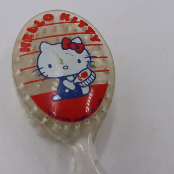 Vintage Sanrio Hello Kitty Hair Brush with Charm Rare 1976